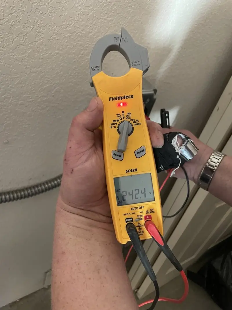 Voltage testing with clamp meter during Hot Tub / Pool Electrical Wiring in Lyons